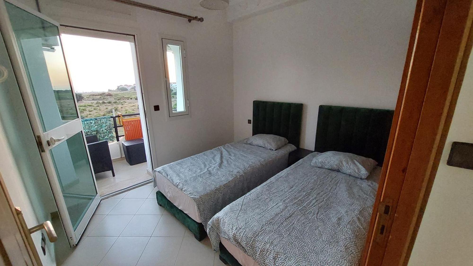 Appartement Avec Piscines, Vue Sur Mer Et Acces A La Plage A Achakar Hill, Tanger. Kültér fotó