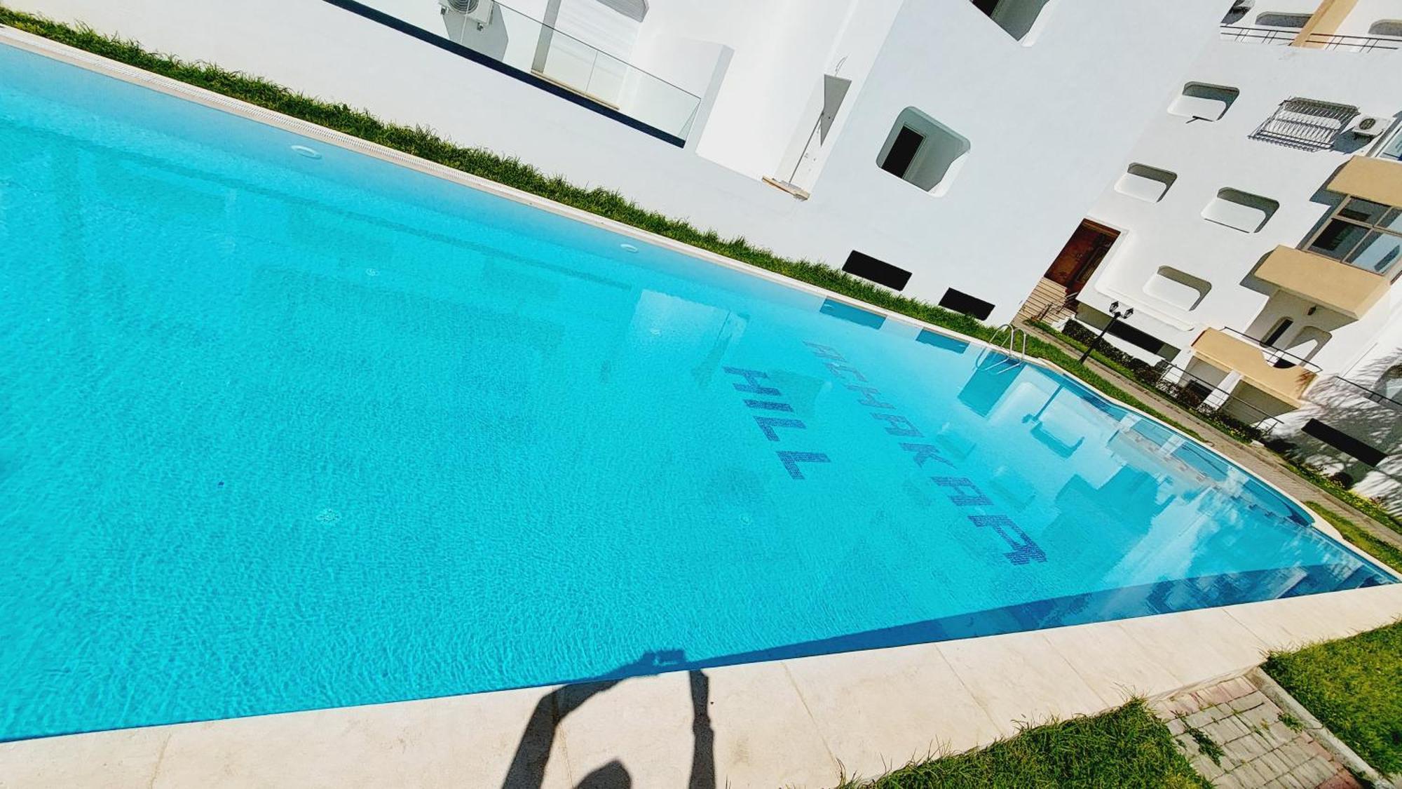 Appartement Avec Piscines, Vue Sur Mer Et Acces A La Plage A Achakar Hill, Tanger. Kültér fotó